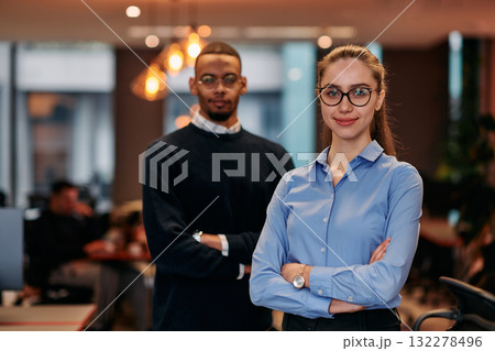Digital Collaboration: Blonde Businesswoman and African American Partner Reviewing Documents Online Digital Collaboration: Blonde Businesswoman and African American Partner Reviewing Documents Online 132278496