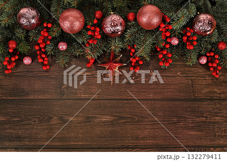 Festive winter greeting card and banner on the screen, Beautiful Christmas and New Year background with lights, decorations, toys and live fir branches, product design for holiday advertising, Festive winter greeting card and banner on the screen, Beautiful Christmas and New Year background with lights, decorations, toys and live fir branches, product design for holiday advertising, 132279411