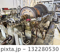 A Large Industrial Turbine is Undergoing Maintenance in a Workshop 132280530