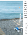 Relaxing Beach Scene With Lounge Chairs and a Serene Ocean View 132280534