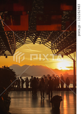 Oct 1 2025 Sunset Silhouettes On A Modern Rooftop Pier As People 132282483