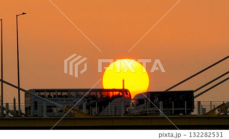 Oct 7 2025 Sunset Over Cable-Stayed Bridge At Dusk With Aircraft Silhouette 132282531