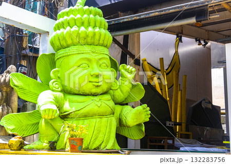 Green Banana plant tree man statue in Patong Phuket Thailand. 132283756