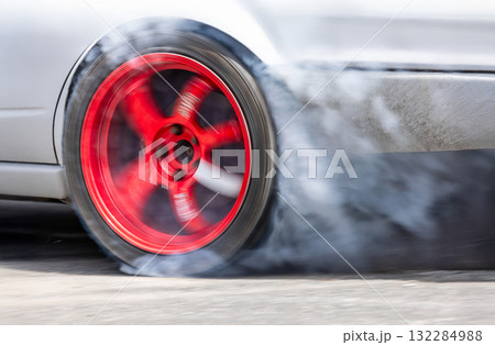 Smoke on wheel and Speed of drift race car. 132284988