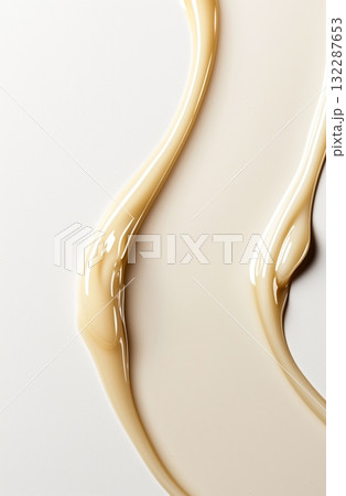 Creamy beige liquid abstract pattern on white background Creamy beige liquid abstract pattern on white background 132287653