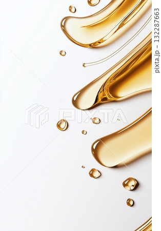Golden liquid droplets on smooth white surface with flowing curves 132287663