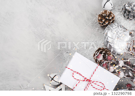 Festive Christmas background with gift boxes and Christmas decorations. Festive Christmas background with gift boxes and Christmas decorations. 132290798