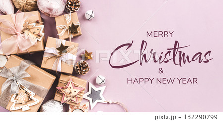 Festive Christmas background with gift boxes and Christmas decorations 132290799