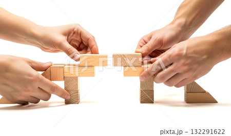 Team hands building bridge with wooden blocks for concept of collaboration, teamwork, group support, and achieving a common business goal 132291622