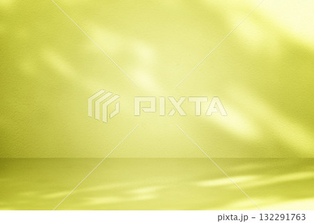 Stucco Table and Wall Background with Spotlight in Yellow Tone Stucco Table and Wall Background with Spotlight in Yellow Tone 132291763