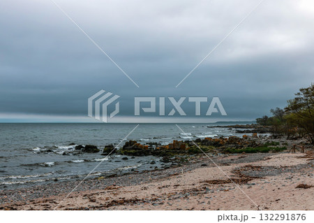 Sea sandy beach in cloudy weather. Seascape Sea sandy beach in cloudy weather. Seascape 132291876