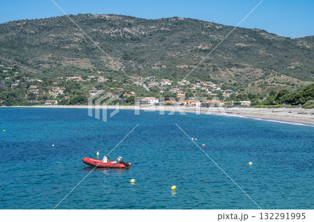 Spectacular view Golf at Sagone Corsica France beautyful sand Beach boats mountain village Tourism and vacations concept 132291995