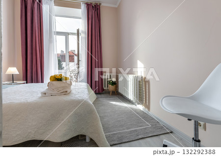 Bright Bedroom with Balcony and Pink Curtains in Modern Apartment Bright Bedroom with Balcony and Pink Curtains in Modern Apartment 132292388