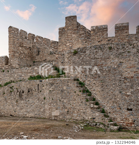 Ayasuluk Castle's ancient stone walls and battlements, Selcuk, Turkey, under a soft, cloudy sky 132294046
