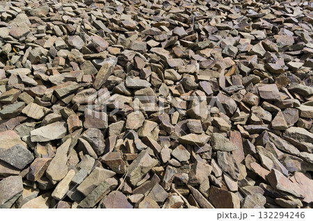 Close-up view of a pile of stones. Material suitable for use in construction. Background for various uses. 132294246