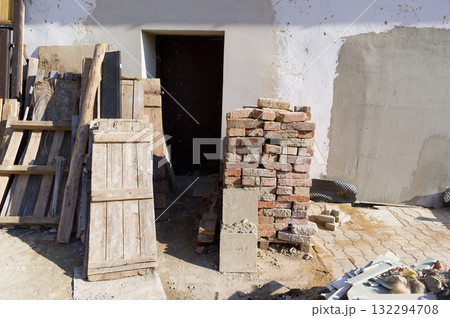 View of a construction waste dump. This waste was generated during the reconstruction of an old house. View of a construction waste dump. This waste was generated during the reconstruction of an old house. 132294708