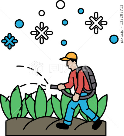 A man is spraying a field with a hose 132295713