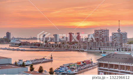 Aerial timelapse panorama of Katendrecht peninsula and Maashaven harbour at sunset in Rotterdam, The Netherlands. 132296612