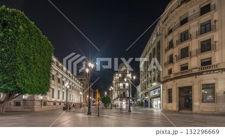 Illuminated Adriatica building on Avenida de la Constitucion at night, Seville, Spain 132296669