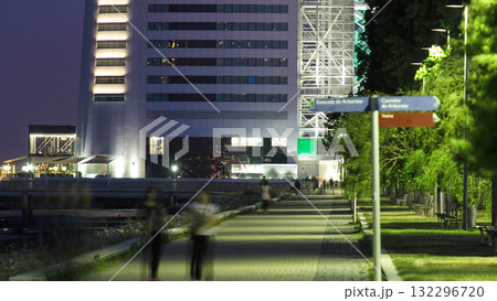 Walkway near Hotel Tower in the Park of the Nations timelapse from day to night Walkway near Hotel Tower in the Park of the Nations timelapse from day to night 132296720