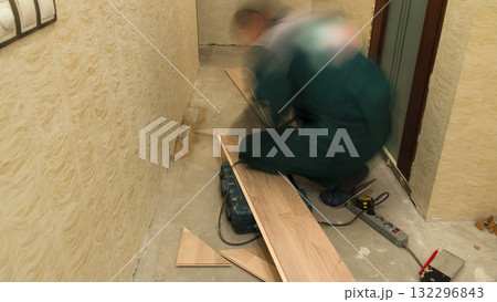 Carpenter worker cutting wooden panel with jig saw timelapse 132296843