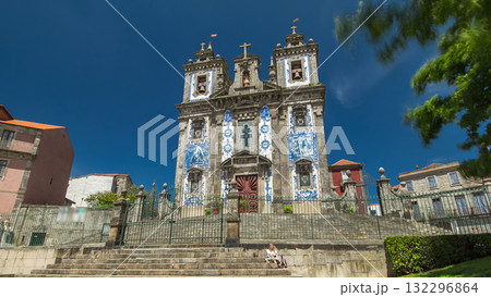 Church of Saint Ildefonso timelapse hyperlapse, covered with typical Portuguese tiles called Azulejos in Porto, Portugal. 132296864