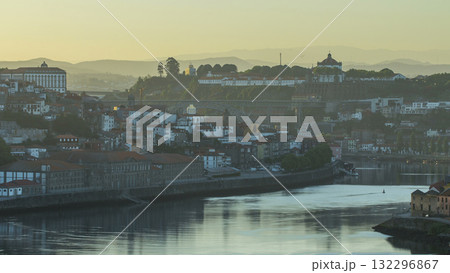 Aerial morning view after sunrise at the most emblematic area of Douro river timelapse. Porto Aerial morning view after sunrise at the most emblematic area of Douro river timelapse. Porto 132296867