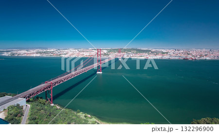 25th of April Suspension Bridge over the Tagus river, connecting Almada and Lisbon in Portugal timelapse 132296900