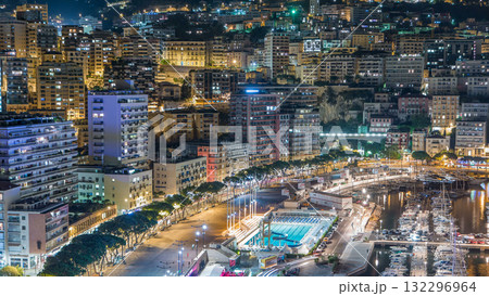 Seaside swimming pool in Monaco night timelapse, buildings in the background. Seaside swimming pool in Monaco night timelapse, buildings in the background. 132296964