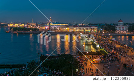Night view of spit of Vasilyevsky Island and Birzhevoy Bridge with rostral column timelapse, Saint Petersburg, Russia. 132296985
