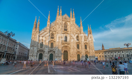 The Duomo cathedral timelapse hyperlapse at sunset. Front view with people walking on square 132297193