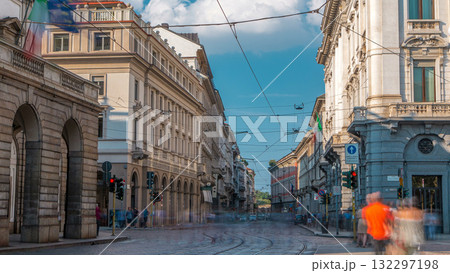 Traffic on Alessandro Manzoni street near main concert hall of Teatro alla Scala, an opera house timelapse in Milan, Italy. Traffic on Alessandro Manzoni street near main concert hall of Teatro alla Scala, an opera house timelapse in Milan, Italy. 132297198