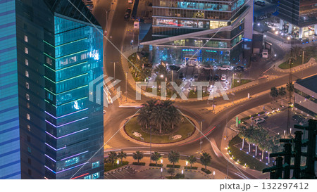 Skyline with Skyscrapers night timelapse in Kuwait City downtown illuminated at dusk. Kuwait City, Middle East 132297412