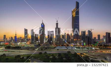 Skyline with Skyscrapers day to night timelapse in Kuwait City downtown illuminated at dusk. Kuwait City, Middle East Skyline with Skyscrapers day to night timelapse in Kuwait City downtown illuminated at dusk. Kuwait City, Middle East 132297421