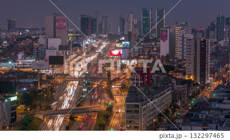 Aerial view of Via Expresa highway and metropolitan bus with traffic day to night timelapse. Lima, Peru Aerial view of Via Expresa highway and metropolitan bus with traffic day to night timelapse. Lima, Peru 132297465
