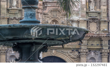 Statue on The Basilica Cathedral of Lima is a Roman Catholic cathedral located in the Plaza Mayor timelapse hyperlapse in Lima, Peru 132297481