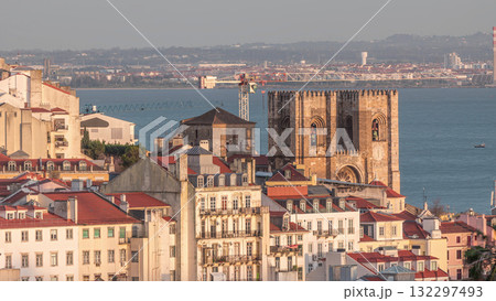 The Lisbon Cathedral the Se surrounded by residential houses of Alfama and Baixa aerial timelapse. Portugal The Lisbon Cathedral the Se surrounded by residential houses of Alfama and Baixa aerial timelapse. Portugal 132297493