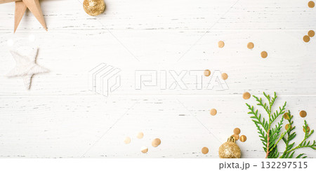 Festive Christmas background with gift boxes and Christmas decorations Festive Christmas background with gift boxes and Christmas decorations 132297515