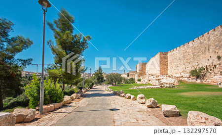 Defensive wall of the ancient holy Jerusalem timelapse hyperlapse, lit by the bright sun. Defensive wall of the ancient holy Jerusalem timelapse hyperlapse, lit by the bright sun. 132297570