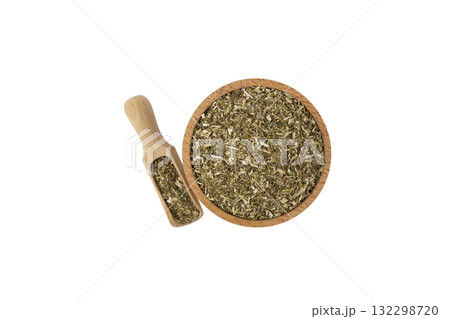 Dry Tansy Herb in latin Tanacetum vulgare in latin sambuci flos in wooden bowl and scoop isolated on white background. Medicinal herb. Dry Tansy Herb in latin Tanacetum vulgare in latin sambuci flos in wooden bowl and scoop isolated on white background. Medicinal herb. 132298720