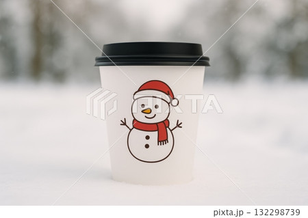 Cute snowman illustration on white paper coffee cup, set against snowy winter background, perfect for holiday season. 132298739