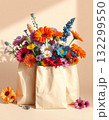 bouquet of colorful flowers in paper bag 132299550