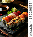 sushi rolls on a black plate 132299554