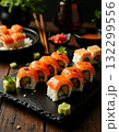 japanese sushi rolls on a black plate 132299556