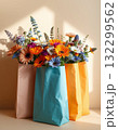 beautiful flowers in paper bag on table 132299562