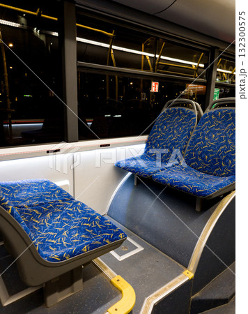 Blue seat places in trolley bus 132300575