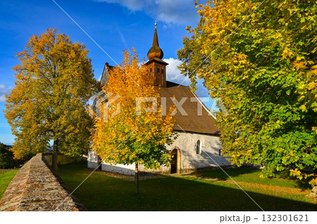 The Chapel of the Mother of God. City of Brno, Czech Republic Europe. Beautiful autumn landscape. Brno dam and sunset at the golden hour. Autumn season October. The Chapel of the Mother of God. City of Brno, Czech Republic Europe. Beautiful autumn landscape. Brno dam and sunset at the golden hour. Autumn season October. 132301621
