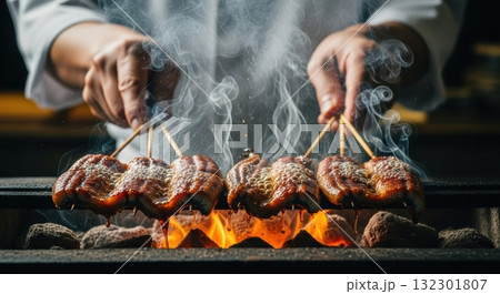 うなぎの蒲焼を炭火で焼き上げる職人 うなぎの蒲焼を炭火で焼き上げる職人 132301807