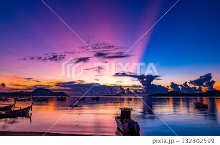 Beautiful sunset or sunrise over the sea with colorful clouds,Amazing clouds and majestic light nature background 132302599