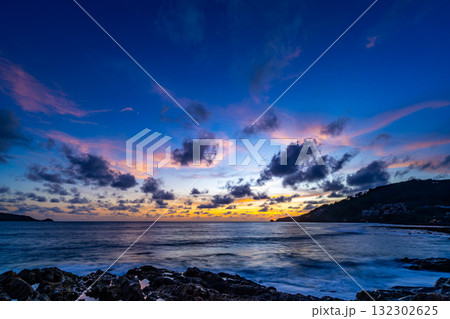 Beautiful sunset or sunrise over the sea with colorful clouds,Amazing clouds and majestic light nature background 132302625